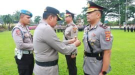 Acara Sertijab berlangsung di Lapangan Satya Haprabu Polres Lampung Timur.
Sumber: Agus Sahroni/Humas Polres Lampung Timur