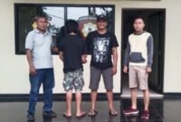 Tersangka saat diamankan oleh anggota Polsek Mataram Baru.
Sumber: Agus Sahroni/Humas Polres Lampung Timur. 
