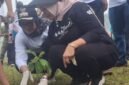 Bupati Lampung Timur Ela Siti Nuryamah dan Ketua DPRD Rida Totul Aliah tanam pohon di rea area Labuhanratu./ Agus Susanto